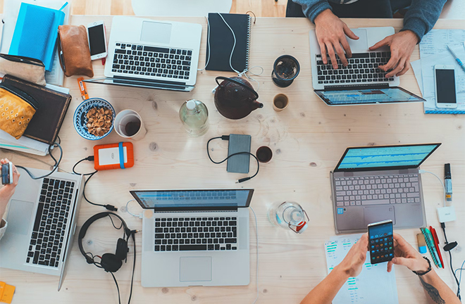 photo - closeup of a table where a meeting is happening