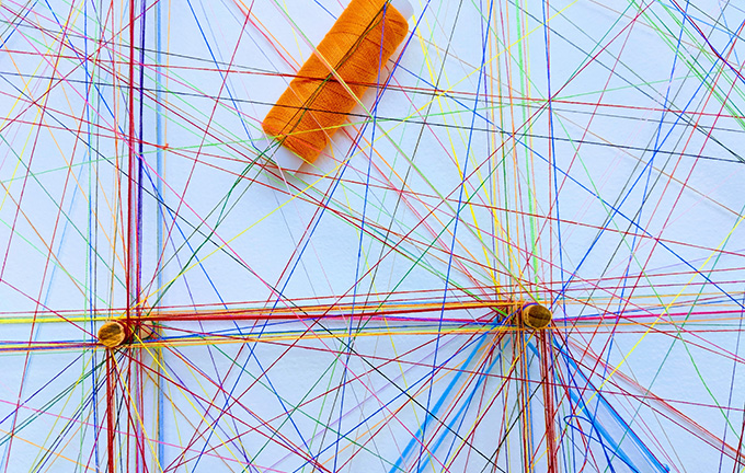 photo – an unravelled ball of thread